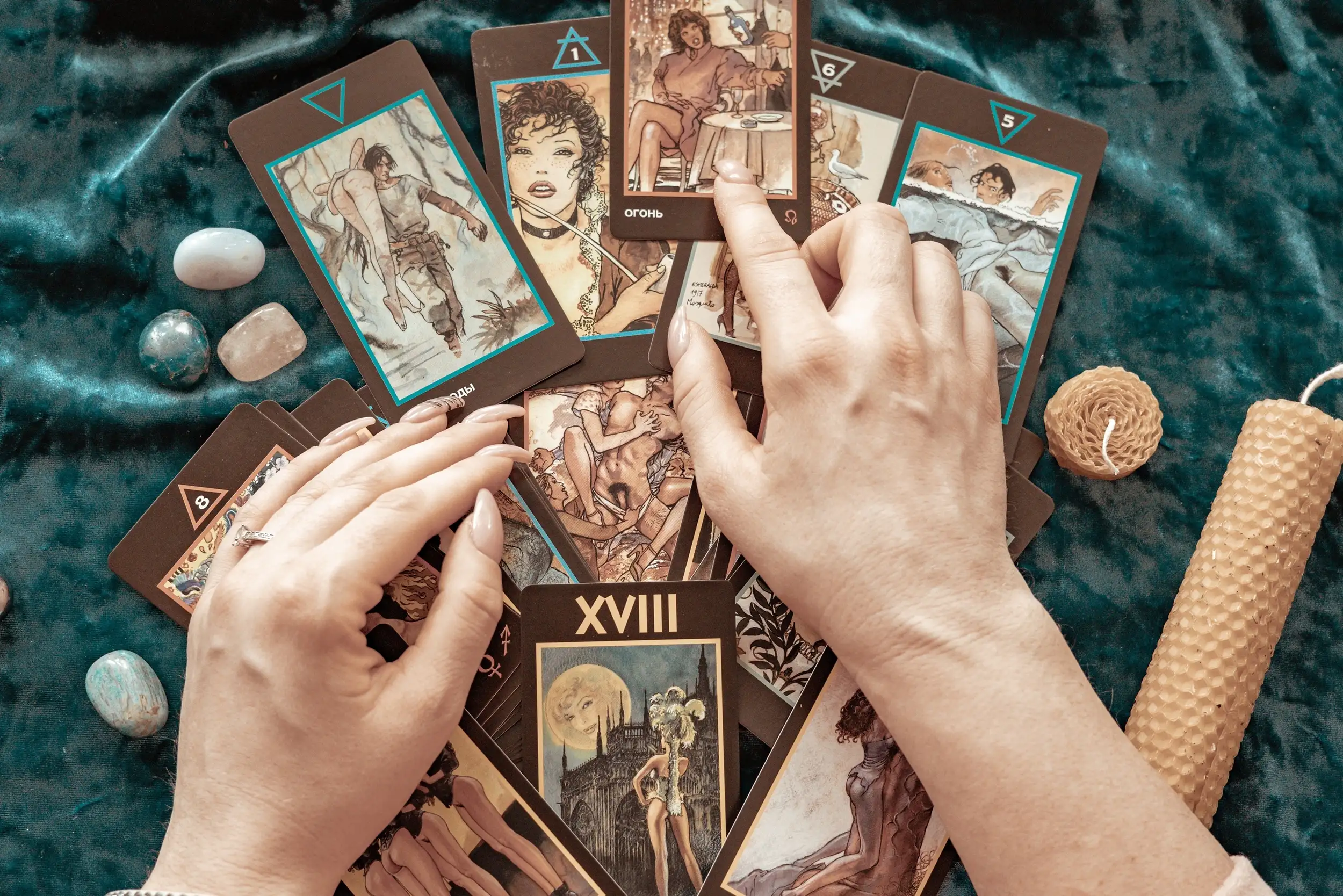 A table full of tarot cards and reading each meaning by the psychic.